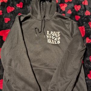 Love Never Fails Hoodie